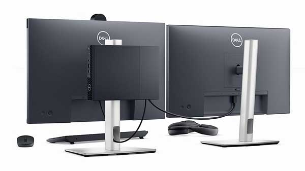 Imagem de um computador Dell OptiPlex 3000 Micro conectado a monitores, teclado, mouse e headset, todos vistos de cima.