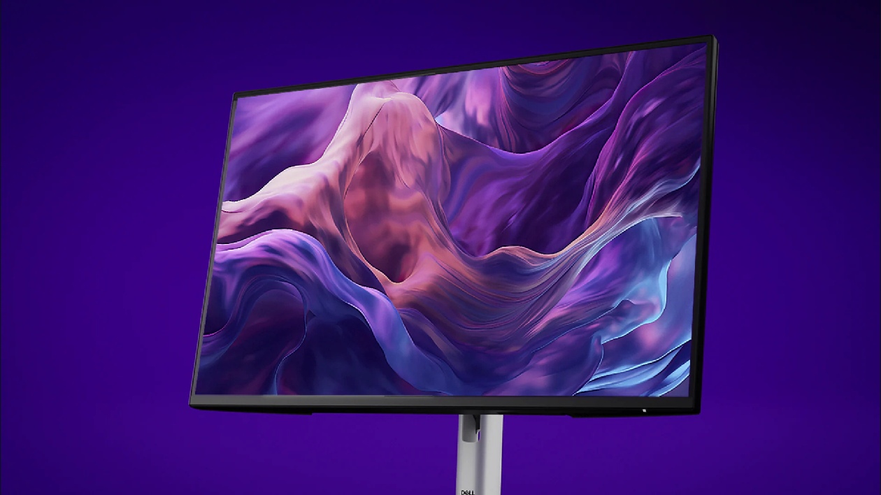 Monitor Dell P2425HE Pro Plus preto profissional em angulo frontal exibindo gr&aacute;fico colorido no painel IPS Full HD 100Hz