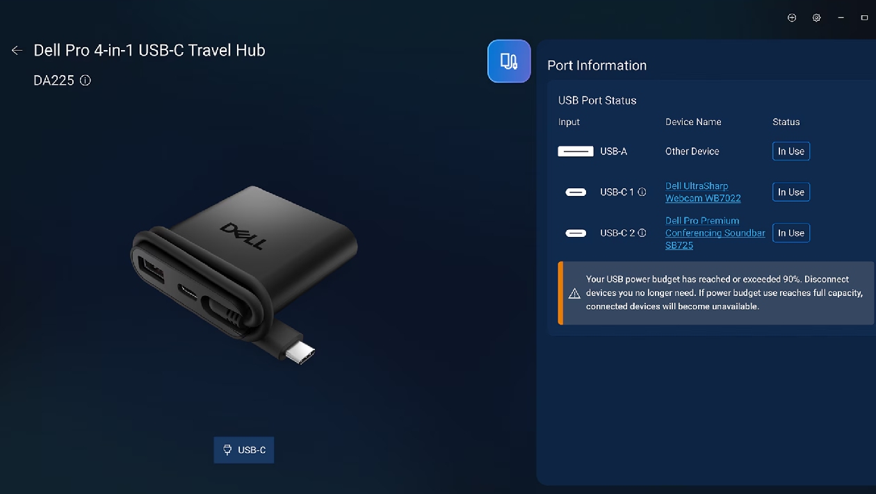 Interface do Dell Peripheral Manager exibindo o hub DA225 em renderização 3D com painel de status das portas USB-A, USB-C 1 com webcam e USB-C 2 com soundbar, e alerta de Power Budget acima de 90%