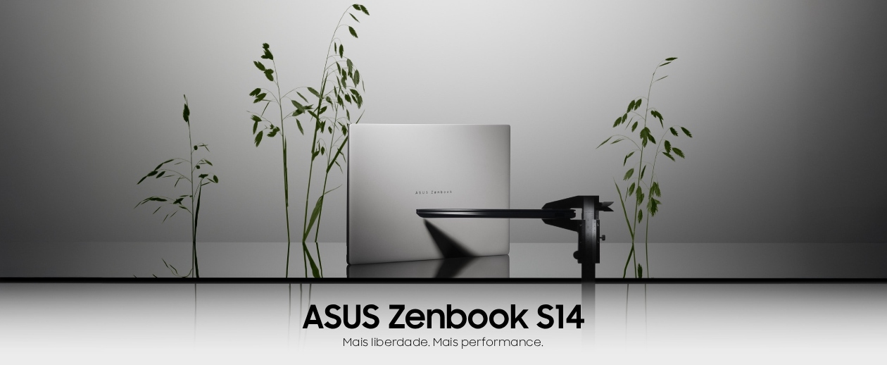 ASUS Zenbook S 14 UX5406AA em tom cinza/prata sobre superfície reflexiva